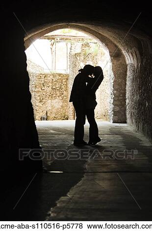 Italy, Venice, Young couple kissing in archway View Large Photo Image Stock Photo - Italy, Venice, Young couple kissing in archway. Fotosearch