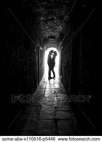 Italy, Venice, Young couple kissing in archway View Large Photo Image Stock Photograph - Italy, Venice, Young couple kissing in archway. Fotosearch