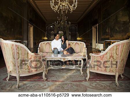 Italy, Venice, Young couple sitting in elegant lounge View Large Photo Image Stock Photo - Italy, Venice, Young couple sitting in elegant lounge. Fotosearch