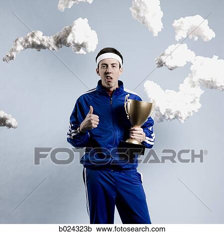 jogger holding a trophy View Large Photo Image Stock Image - jogger holding a trophy. Fotosearch