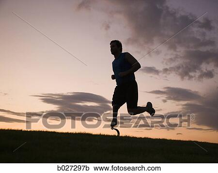 jogger with a right below knee prosthetic running leg View Large Photo Image Stock Image - jogger with a right below knee prosthetic running leg. Fotosearch