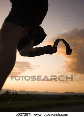 jogger with a right below knee prosthetic running leg View Large Photo Image Stock Image - jogger with a right below knee prosthetic running leg. Fotosearch