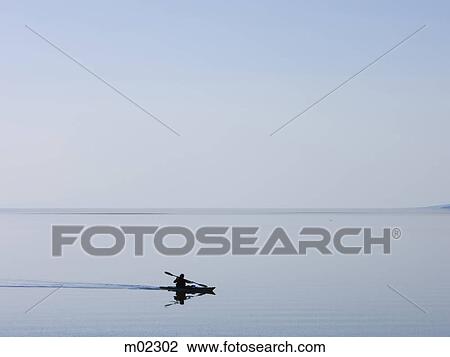 kayak on a lake View Large Photo Image Stock Image - kayak on a lake. Fotosearch