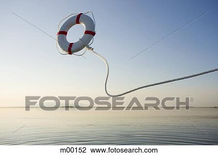 Stock Image - life preserver in the middle of nowhere. Fotosearch