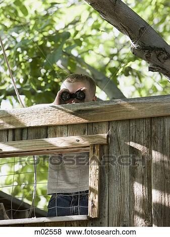 little boy looking through binoculars View Large Photo Image Stock Photo - little boy looking through binoculars. Fotosearch