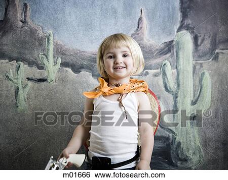 little girl dressing up as a cowgirl View Large Photo Image Stock Photograph - little girl dressing up as a cowgirl. Fotosearch