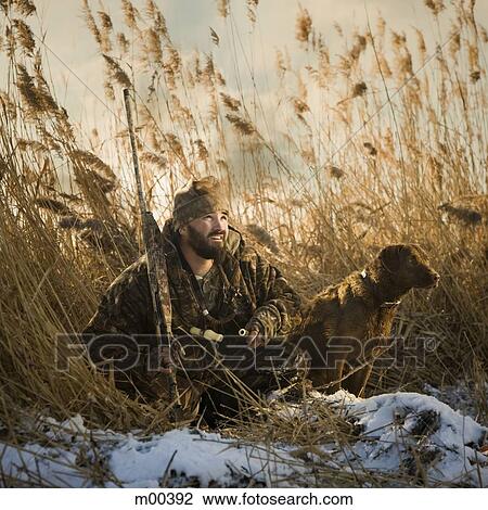 man and his dog duck hunting View Large Photo Image Stock Image - man and his dog duck hunting. Fotosearch