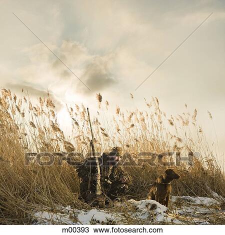 man and his dog duck hunting View Large Photo Image Stock Image - man and his dog duck hunting. Fotosearch