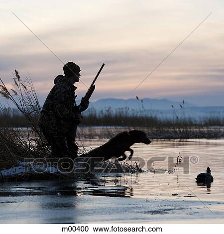 man and his dog duck hunting View Large Photo Image Stock Image - man and his dog duck hunting. Fotosearch