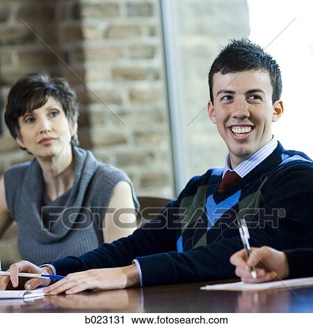 man and woman in a meeting View Large Photo Image Stock Image - man and woman in a meeting. Fotosearch