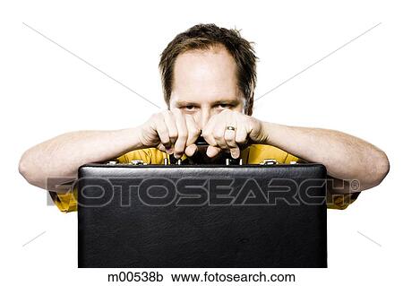 man hiding behind his briefcase View Large Photo Image Stock Image - man hiding behind his briefcase. Fotosearch