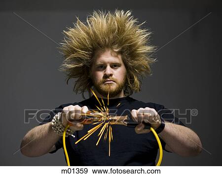 man holding jumper cables View Large Photo Image Stock Photo - man holding jumper cables. Fotosearch