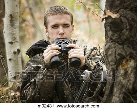 man hunting in the wilderness View Large Photo Image Stock Image - man hunting in the wilderness. Fotosearch