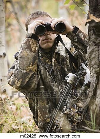 man hunting in the wilderness View Large Photo Image Stock Photo - man hunting in the wilderness. Fotosearch