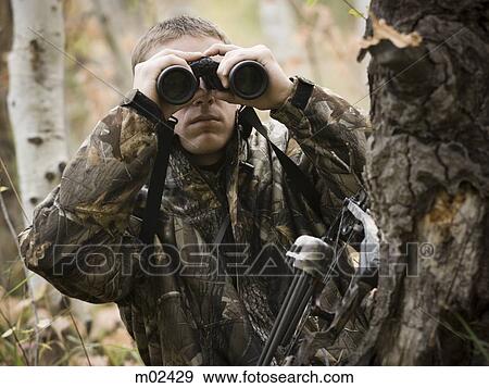 man hunting in the wilderness View Large Photo Image Stock Photo - man hunting in the wilderness. Fotosearch