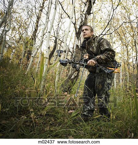 man hunting in the wilderness View Large Photo Image Stock Photo - man hunting in the wilderness. Fotosearch