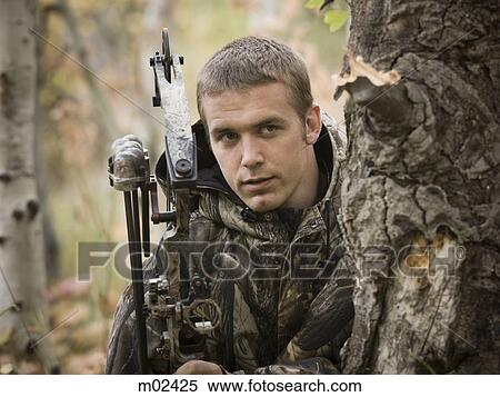 man hunting in the wilderness View Large Photo Image Stock Photography - man hunting in the wilderness. Fotosearch
