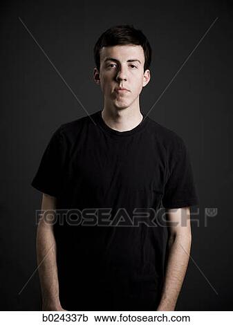 man in a black t-shirt View Large Photo Image Stock Image - man in a black t-shirt. Fotosearch