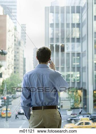 man in a blue shirt at work View Large Photo Image Stock Image - man in a blue shirt at work. Fotosearch