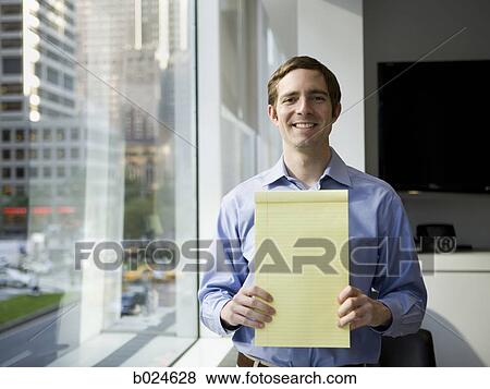 man in a blue shirt at work View Large Photo Image Stock Photo - man in a blue shirt at work. Fotosearch