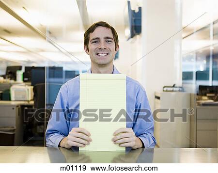 man in a blue shirt at work View Large Photo Image Stock Photo - man in a blue shirt at work. Fotosearch