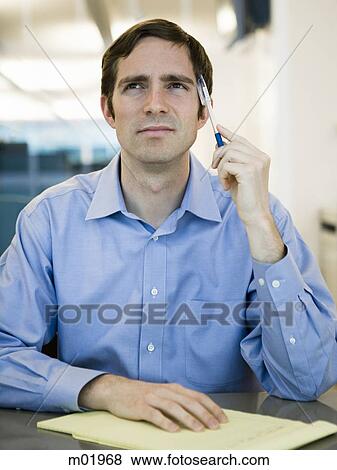man in a blue shirt at work View Large Photo Image Stock Photo - man in a blue shirt at work. Fotosearch