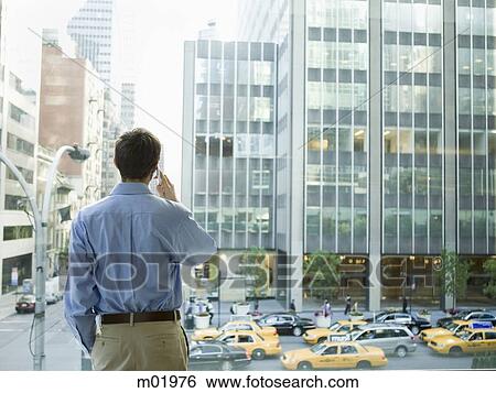 man in a blue shirt at work View Large Photo Image Stock Photograph - man in a blue shirt at work. Fotosearch