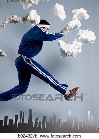 man in a blue tracksuit View Large Photo Image Stock Image - man in a blue tracksuit. Fotosearch