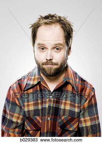 Stock Image - man in a flannel shirt. Fotosearch