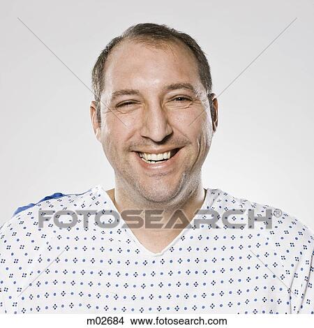 man in a hospital gown View Large Photo Image Picture - man in a hospital gown. Fotosearch