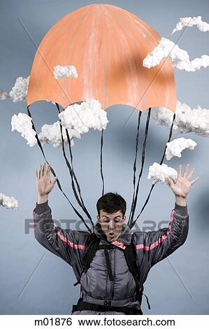 man in a jumpsuit parachuting View Large Photo Image Stock Photograph - man in a jumpsuit parachuting. Fotosearch