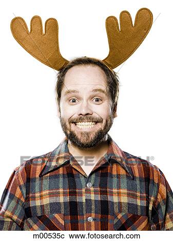 man in a plaid shirt wearing antlers View Large Photo Image Stock Image - man in a plaid shirt wearing antlers. Fotosearch