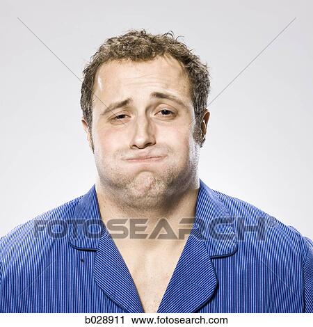 man in his pajamas about to throw up View Large Photo Image Stock Image - man in his pajamas about to throw up. Fotosearch