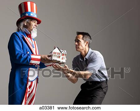 Man in Uncle Sam's costume giving model of house to other man, studio shot View Large Photo Image Stock Image - Man in Uncle Sam's costume giving model of house to other man, studio shot. Fotosearch