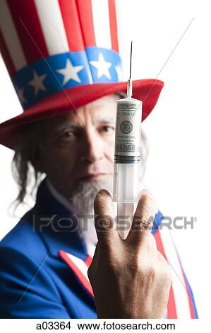 Man in Uncle Sam's costume holding syringe with us dollar banknote inside, studio shot View Large Photo Image Picture - Man in Uncle Sam's costume holding syringe with us dollar banknote inside, studio shot. Fotosearch