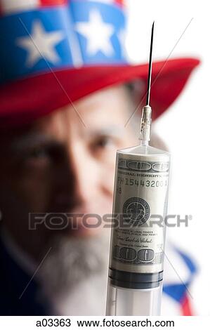 Man in Uncle Sam's costume holding syringe with us dollar banknote inside, studio shot View Large Photo Image Stock Image - Man in Uncle Sam's costume holding syringe with us dollar banknote inside, studio shot. Fotosearch
