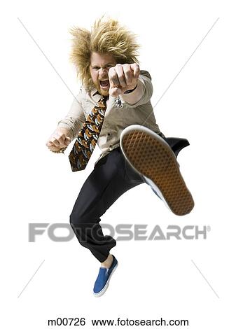 man kicking the air View Large Photo Image Stock Photograph - man kicking the air. Fotosearch