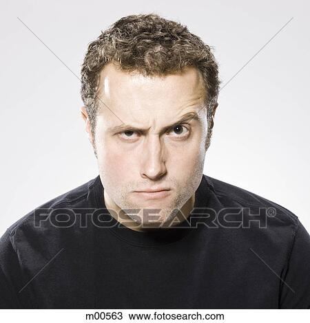 man making an angry face View Large Photo Image Stock Image - man making an angry face. Fotosearch
