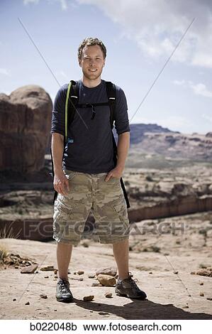 man on a hiking trip in the desert View Large Photo Image Stock Image - man on a hiking trip in the desert. Fotosearch