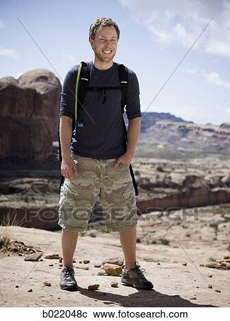 man on a hiking trip in the desert View Large Photo Image Stock Image - man on a hiking trip in the desert. Fotosearch