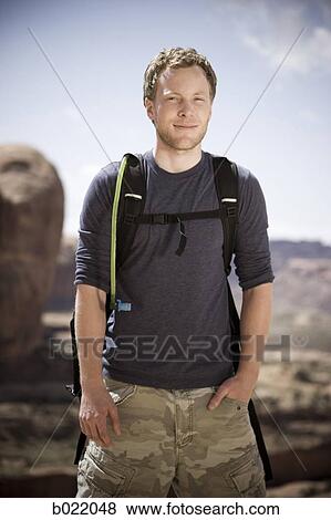 man on a hiking trip in the desert View Large Photo Image Stock Photo - man on a hiking trip in the desert. Fotosearch