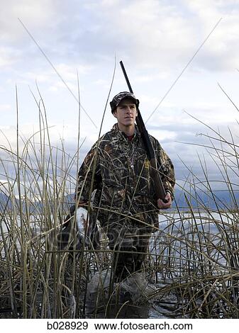 man out hunting View Large Photo Image Stock Photo - man out hunting. Fotosearch