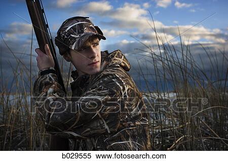 Stock Photography - man out hunting. Fotosearch