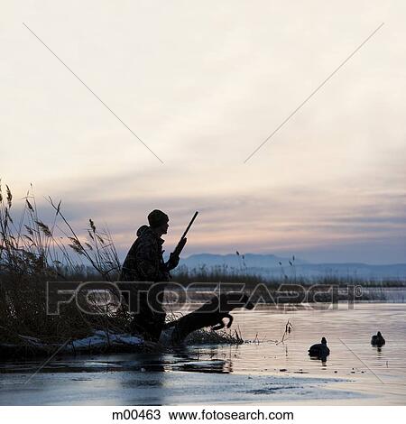 man out hunting with his dog View Large Photo Image Stock Image - man out hunting with his dog. Fotosearch