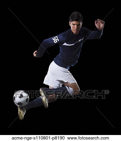 Man playing soccer View Large Photo Image Stock Image - Man playing soccer. Fotosearch