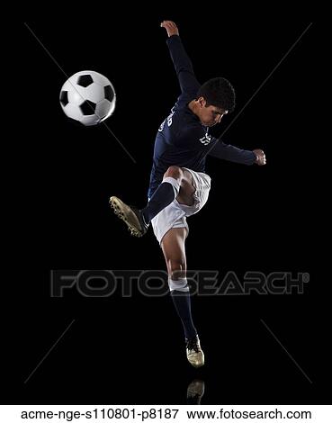 Stock Photo - Man playing soccer. Fotosearch