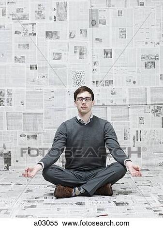 Man practicing yoga in room with walls covered with newspapers View Large Photo Image Stock Photography - Man practicing yoga in room with walls covered with newspapers. Fotosearch