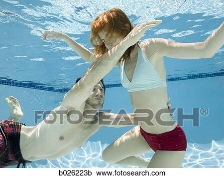 man saving a woman from drowning View Large Photo Image Stock Image - man saving a woman from drowning. Fotosearch