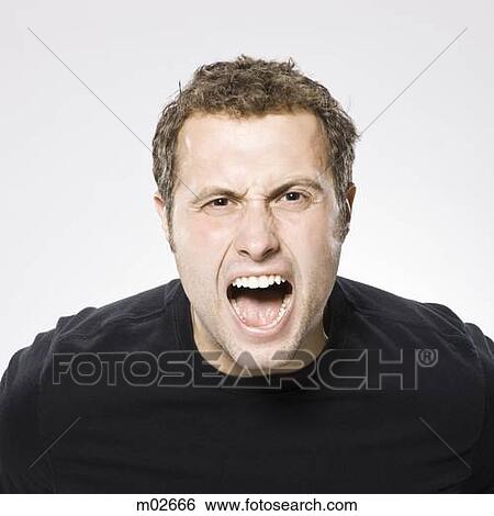 man screaming at the camera View Large Photo Image Stock Photograph - man screaming at the camera. Fotosearch