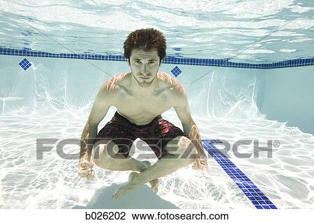 Stock Image - man underwater. Fotosearch